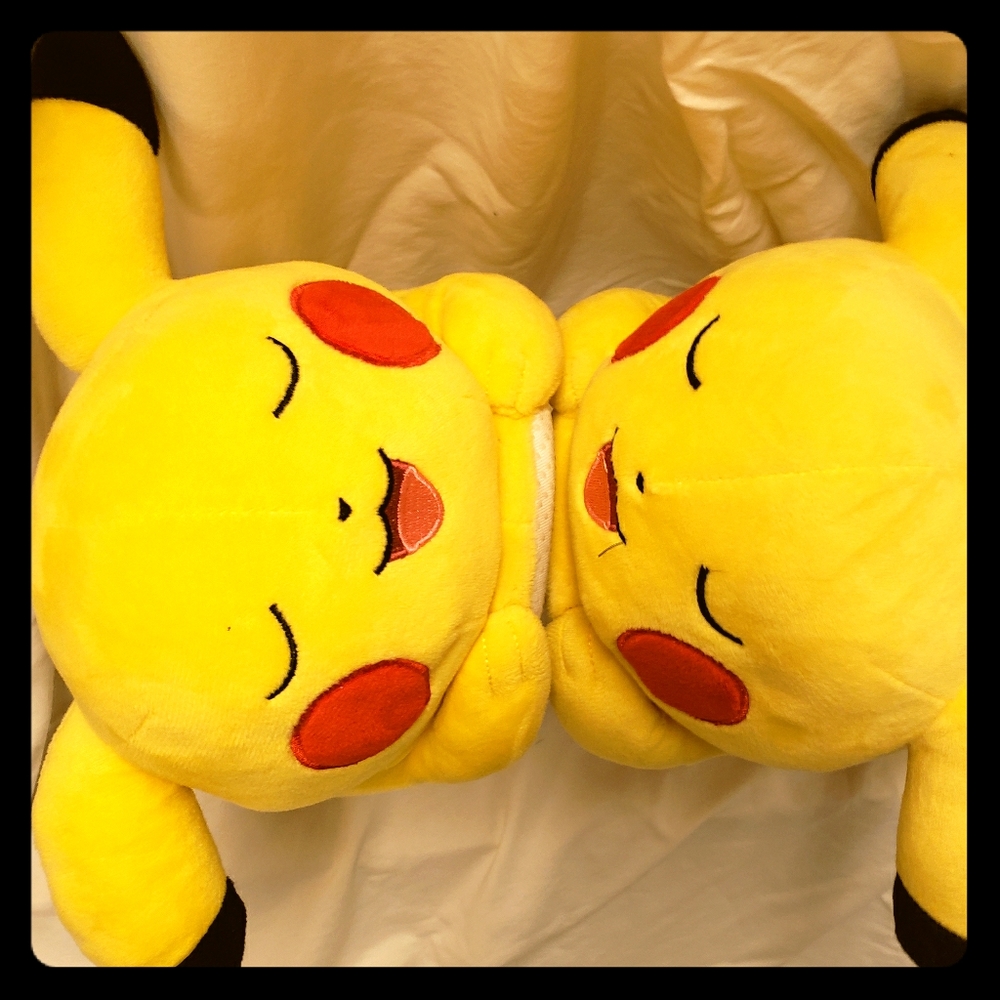 ThinkGeek Pokémon Sleeping Pikachu Light-Up Plush